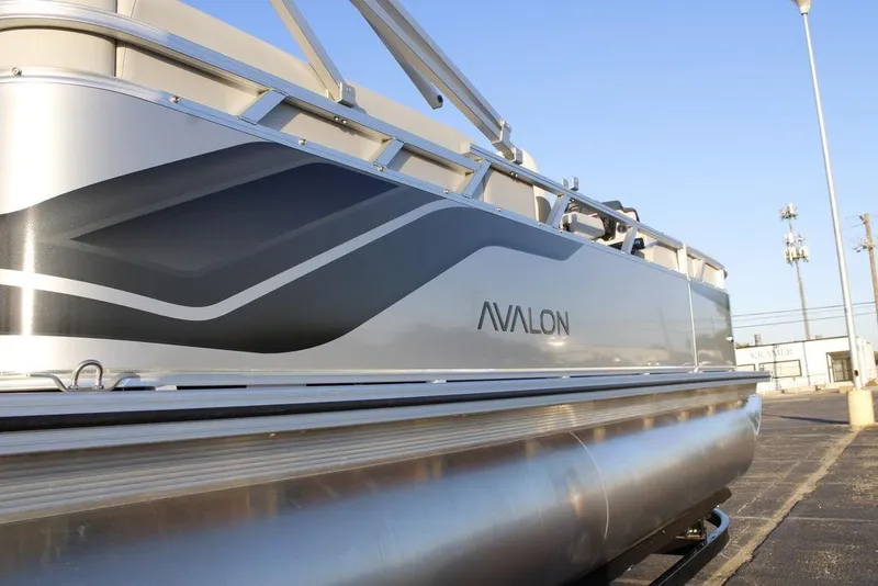 Slide: The Image of 2026 Avalon VLS QUAD LOUNGER 21 pontoon boat with sleek design and modern features. - 37