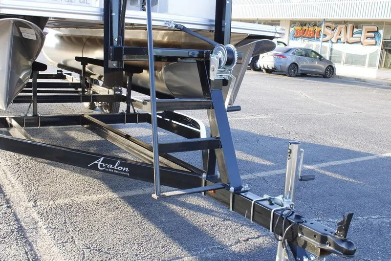 Slide: The Image of 2026 Avalon VLS QUAD LOUNGER 21 pontoon boat on trailer at boat sale. - 5