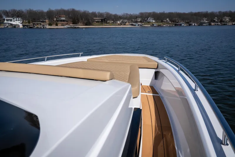 Slide: The Image of Luxurious 2024 Opus OPUS 12 yacht with sun deck on serene lake. - 19