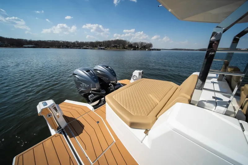 Slide: The Image of Luxury Opus OPUS 12 boat with twin engines on a serene lake, 2024 model. - 28