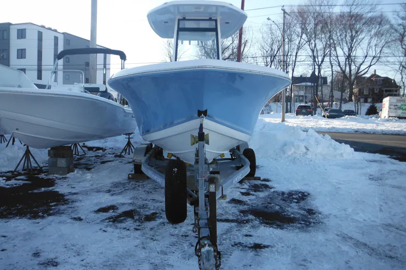 Slide: The Image of 2026 Tidewater 220 LXF boat on trailer in snowy outdoor setting. - 10