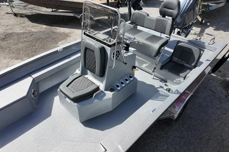 Slide: The Image of 2026 Xpress H22B Bay boat interior with seating and console, featuring modern design. - 8