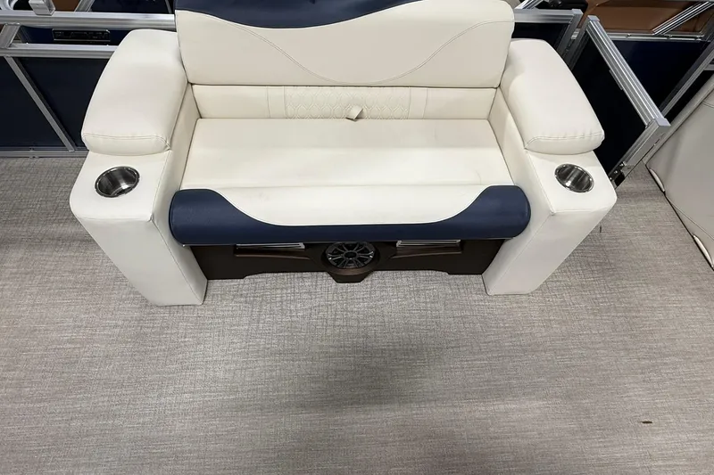 Slide: The Image of Luxurious seating on 2026 Avalon LSZ Elite 21' boat with cup holders and speaker. - 12