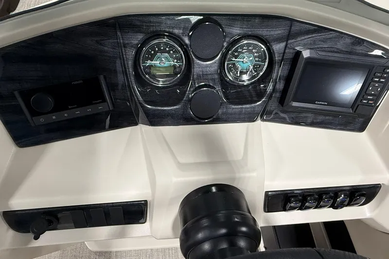Slide: The Image of Dashboard of 2026 Avalon LSZ Elite 21' with gauges and Garmin display. - 14