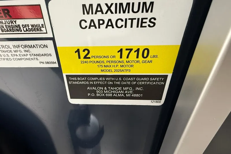 Slide: The Image of 2026 Avalon LSZ Elite boat capacity label, 12 persons or 1710 lbs, US Coast Guard compliant. - 15