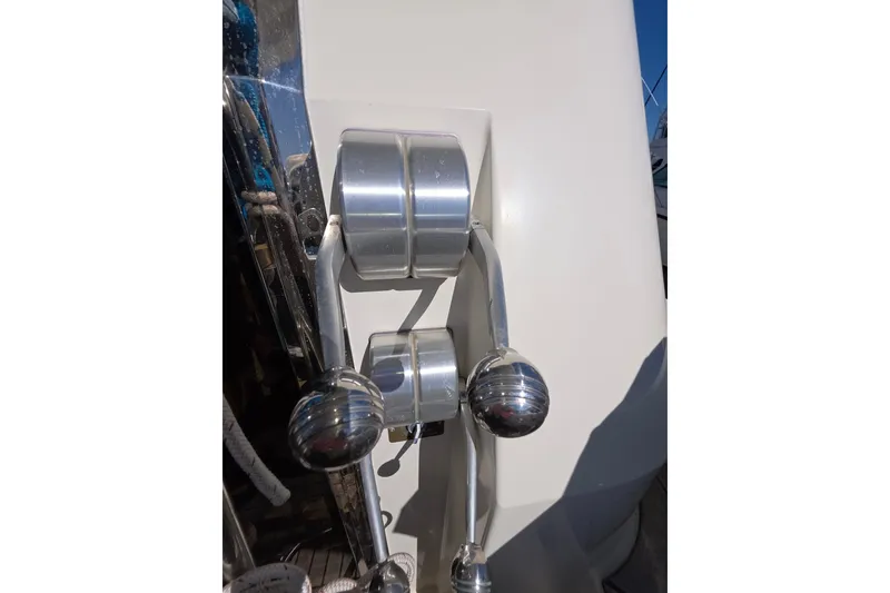 Slide: The Image of Close-up of throttle controls on a 2000 McKinna 48 Pilothouse yacht. - 60