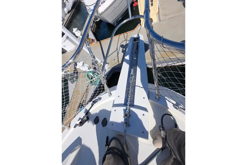 Slide: The Image of Bow view of 2000 McKinna 48 Pilothouse yacht at dock. - 74