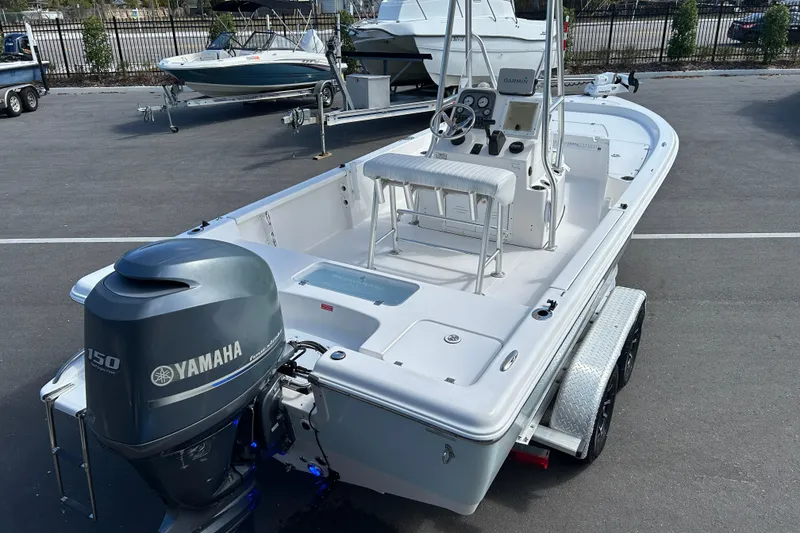 Slide: The Image of 2014 Tidewater 2100 Bay Max boat with Yamaha engine, parked on a trailer. - 7