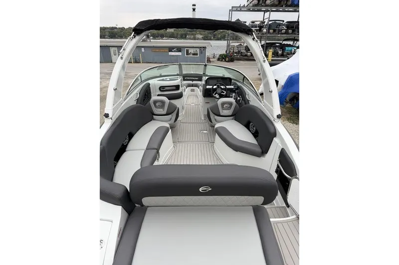 Slide: The Image of 2026 Crownline 288 SS boat interior with sleek seating and modern design. - 12