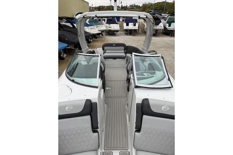 Slide: The Image of 2026 Crownline 288 SS boat interior with sleek seating and modern design. - 8