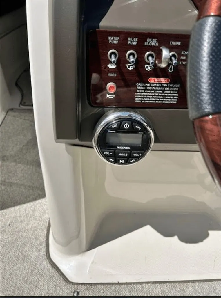 Slide: The Image of Dashboard of a 2010 Sea Ray 220 boat. - 3