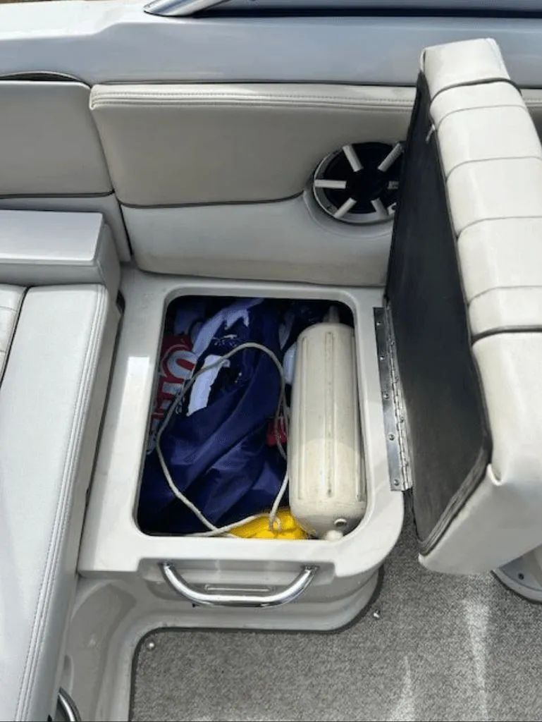 Slide: The Image of Storage compartment in 2010 Sea Ray 220 boat. - 9