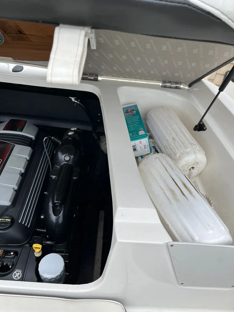 Slide: The Image of Engine compartment of a 2018 Stingray 235 LR with accessories. - 9