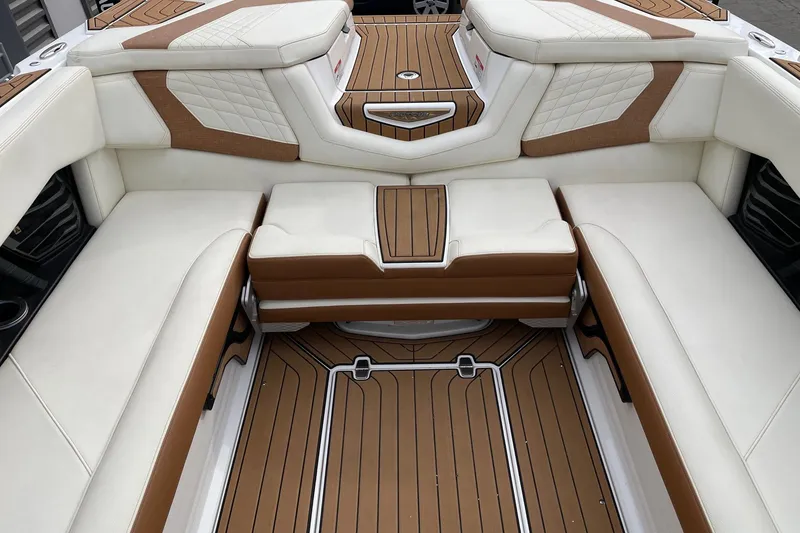 Slide: The Image of Luxurious interior of 2021 Nautique Super Air Nautique G25 boat with elegant seating. - 8