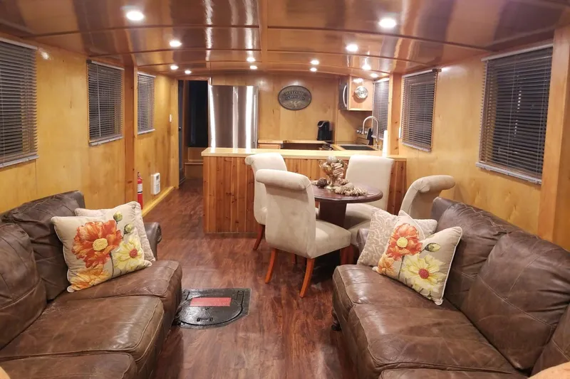 Slide: The Image of Luxurious 1958 Stephens Brothers Naval Yard Patrol Craft interior with leather sofas and wooden decor. - 8