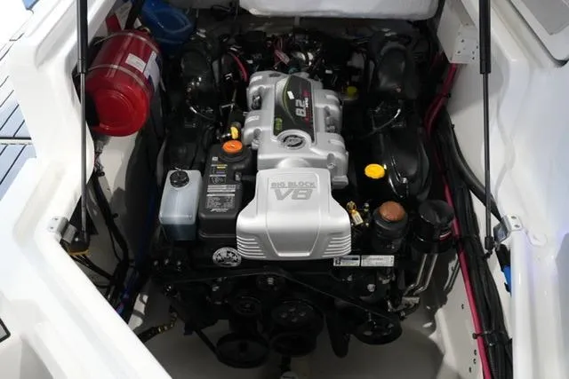 Slide: The Image of 2026 Sea Ray SLX 280 engine compartment showcasing powerful V8 engine. - 26