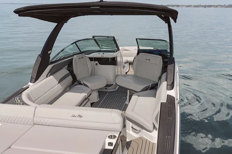 Slide: The Image of Manufacturer Provided Image: 2025 Sea Ray SLX 280 luxury boat interior with spacious seating on calm water. - 7