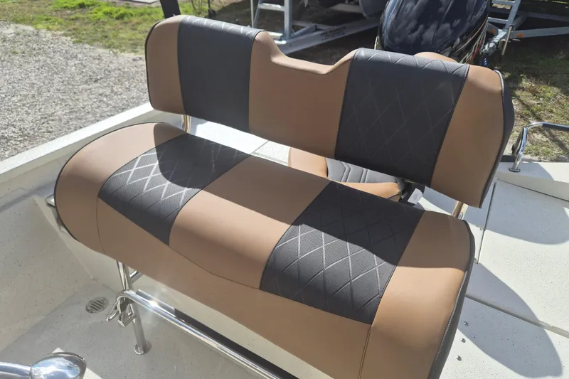 Slide: The Image of 2026 Xpress H20 boat seat with brown and black diamond-patterned upholstery. - 5