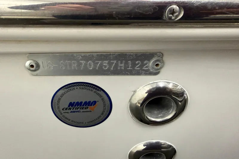 Slide: The Image of 2020 Starcraft 2000 IO Limited boat with NMMA certification and serial number plate. - 11