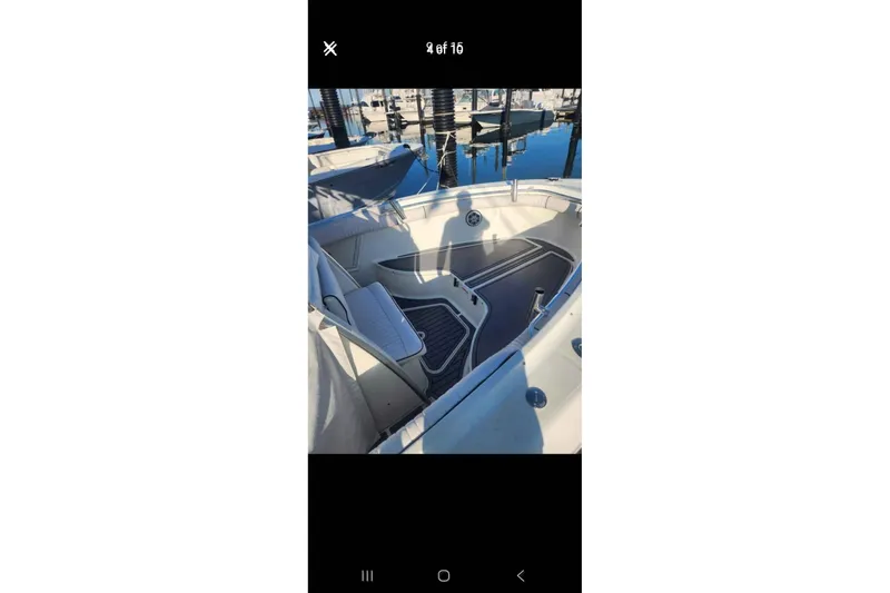 Slide: The Image of 2003 Hydra-Sports Vector 2600 CC boat interior with seating and deck details. - 5
