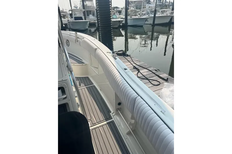 Slide: The Image of 2003 Hydra-Sports Vector 2600 CC boat docked at marina, interior view. - 9