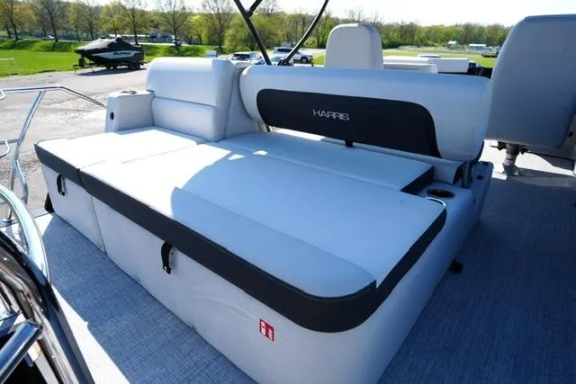 Slide: The Image of 2026 Harris Cruiser 210 boat interior with spacious seating and modern design. - 21