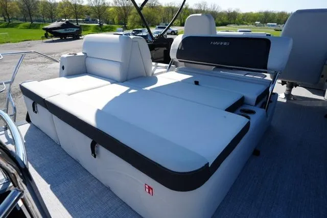 Slide: The Image of 2026 Harris Cruiser 210 boat with spacious seating and modern design. - 22