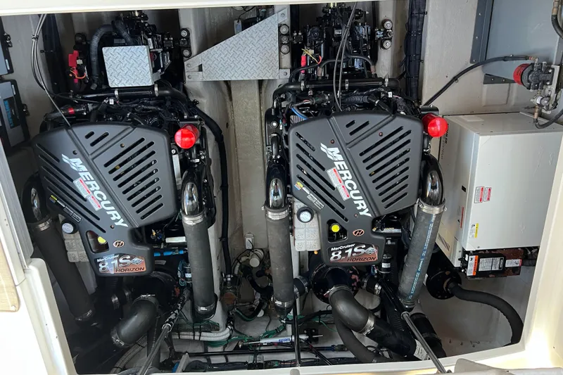 Slide: The Image of Engine room of 2005 Sea Ray 390 Express Cruiser with twin Mercury 8.1S Horizon engines. - 26