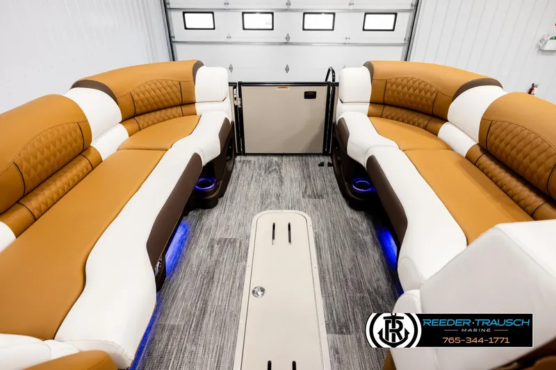 Slide: The Image of Luxurious interior of 2026 Avalon Excalibur LTD FL boat with elegant seating and ambient lighting. - 18