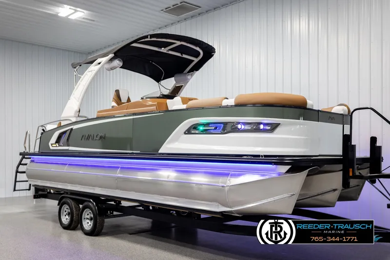 Slide: The Image of 2026 Avalon Excalibur LTD FL pontoon boat with modern design and LED lighting. - 3