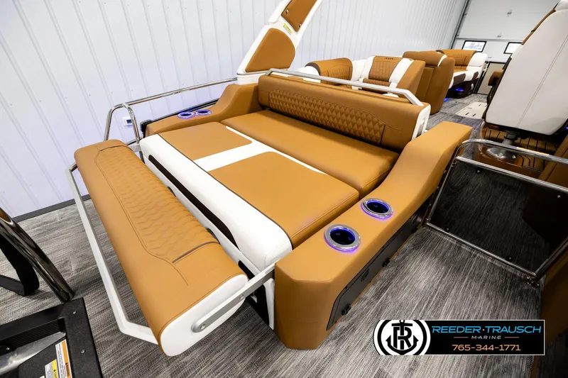 Slide: The Image of Luxurious seating on 2026 Avalon Excalibur LTD FL boat with cup holders and modern design. - 32
