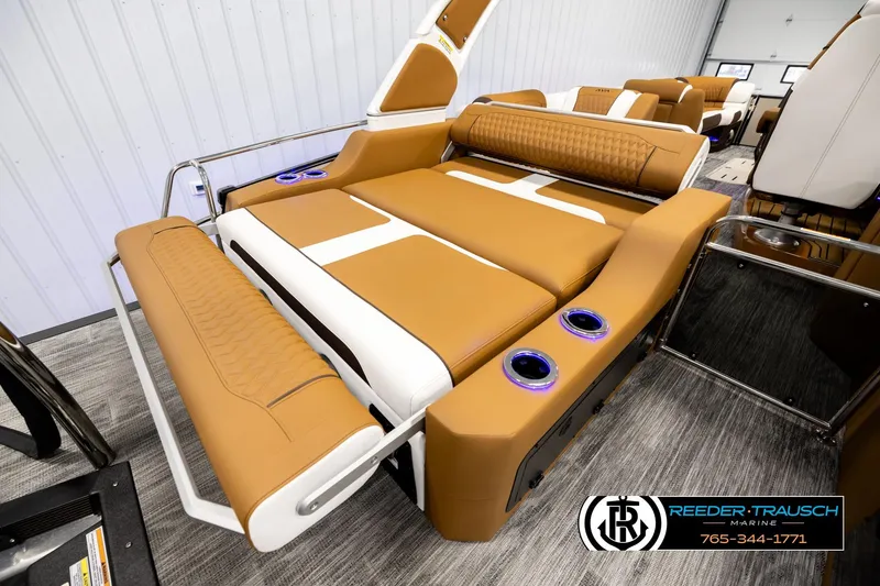 Slide: The Image of Luxurious seating on 2026 Avalon Excalibur LTD FL boat with cup holders and elegant design. - 33