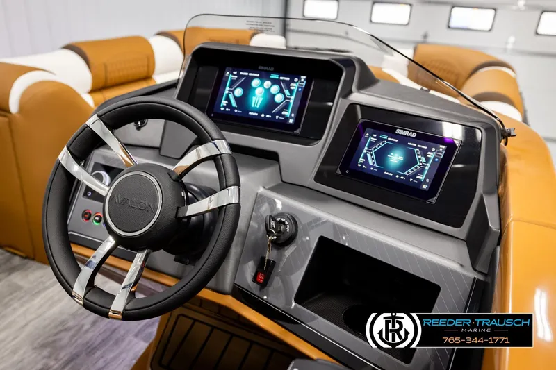 Slide: The Image of 2026 Avalon Excalibur LTD FL dashboard with dual Simrad displays and steering wheel. - 35