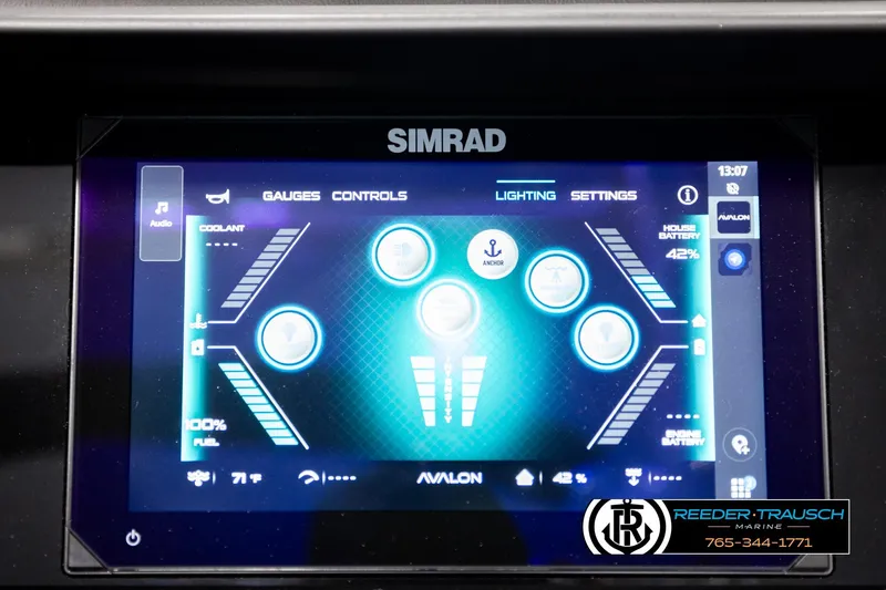 Slide: The Image of 2026 Avalon Excalibur LTD FL dashboard with Simrad touchscreen controls and settings display. - 39