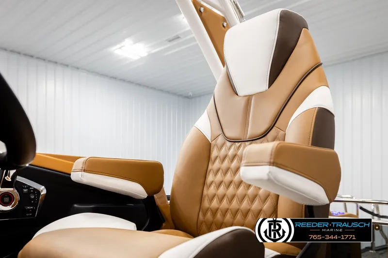 Slide: The Image of Luxurious brown and white seat in 2026 Avalon Excalibur LTD FL boat interior. - 43