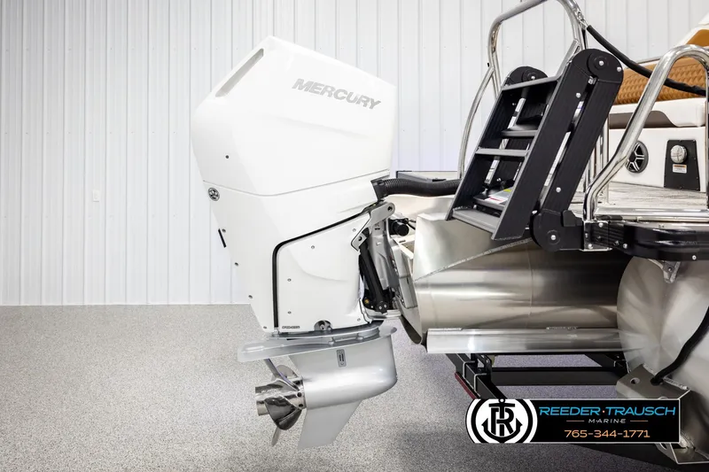 Slide: The Image of 2026 Avalon Excalibur LTD FL boat with Mercury outboard motor and ladder. - 55