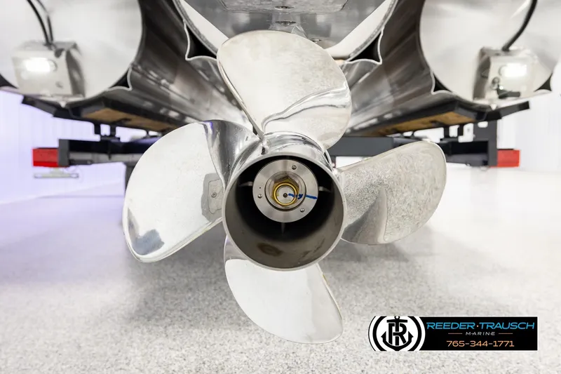 Slide: The Image of Close-up of 2026 Avalon Excalibur LTD FL boat propeller in showroom. - 58