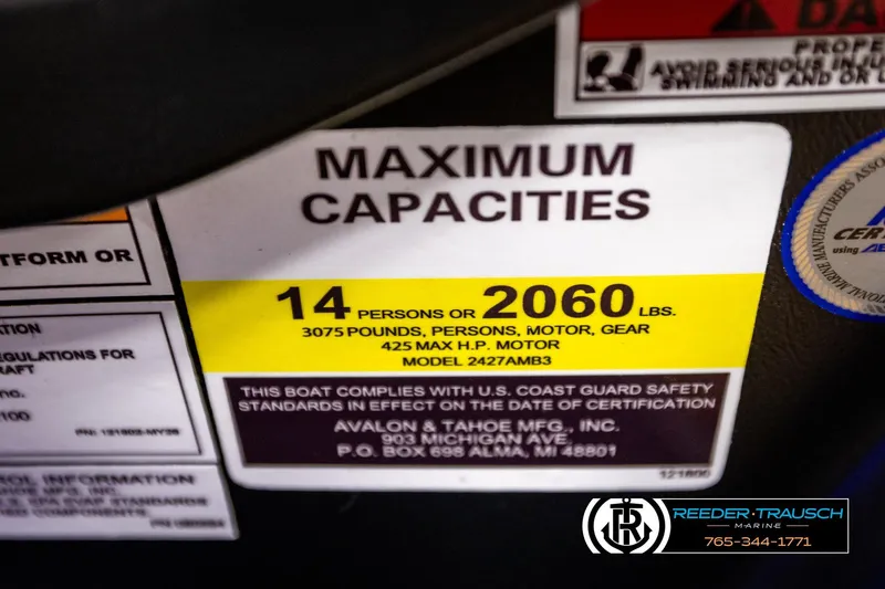 Slide: The Image of Maximum capacity label for Avalon Excalibur LTD FL 2026, 14 persons or 2060 lbs. - 65