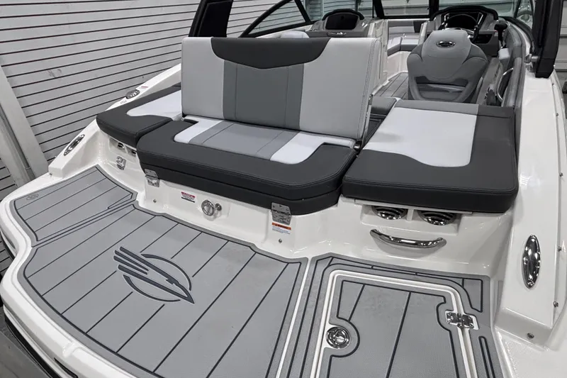 Slide: The Image of 2026 Chaparral 21 SSi boat interior with sleek seating and modern design. - 12