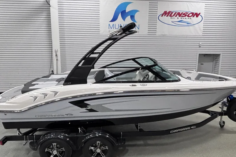 Slide: The Image of 2026 Chaparral 21 SSi boat on display at Munson Ski & Marine showroom. - 7