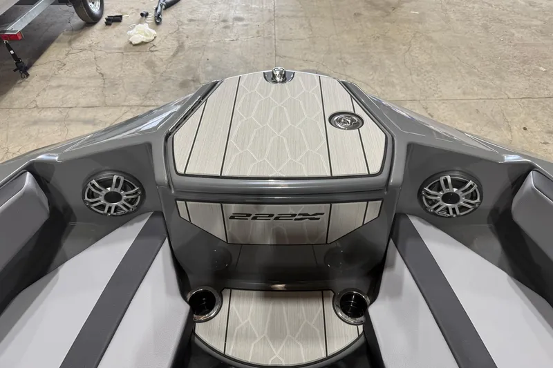 Slide: The Image of 2025 Yamaha Boats 222XD interior with sleek design and modern audio system. - 8