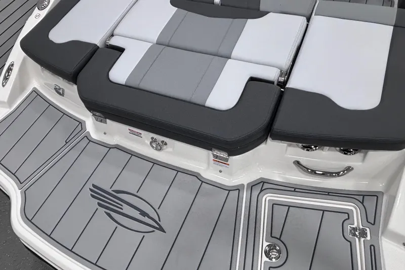 Slide: The Image of 2026 Chaparral 21 SSi boat with sleek gray seating and deck design. - 11