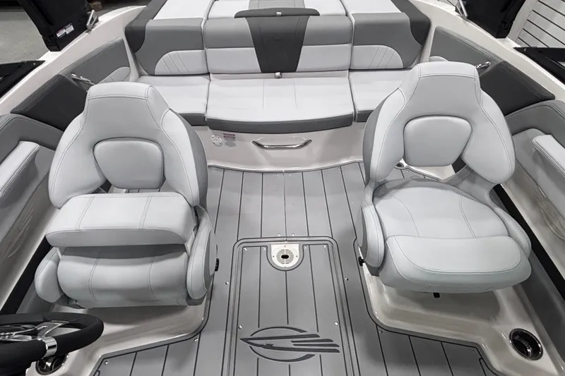 Slide: The Image of 2026 Chaparral 21 SSi boat interior with gray seating and modern design. - 18