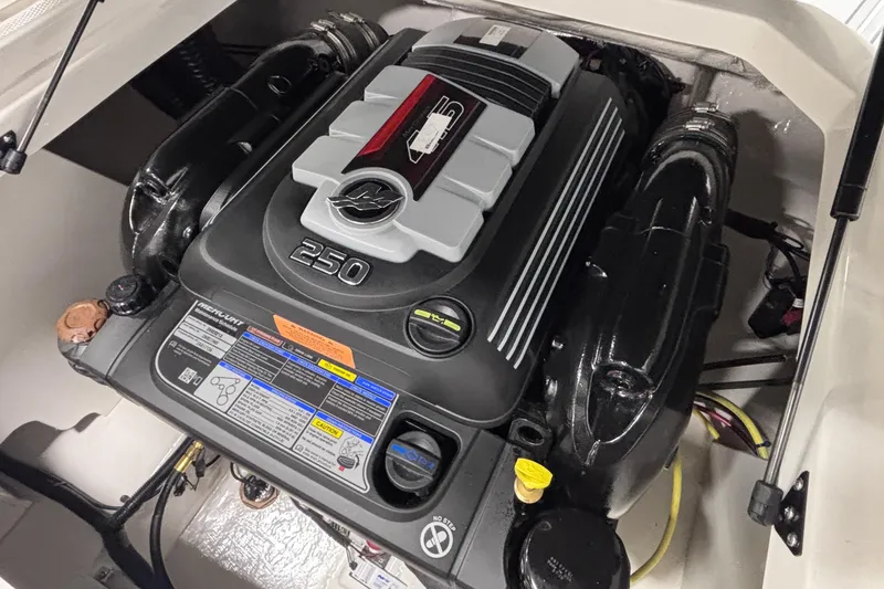 Slide: The Image of Engine compartment of 2026 Chaparral 21 SSi boat, featuring a powerful 250 horsepower engine. - 20