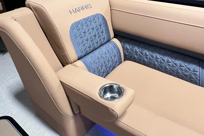 Slide: The Image of Luxurious seating in 2025 Harris Solstice 230 boat with cup holder and quilted design. - 10