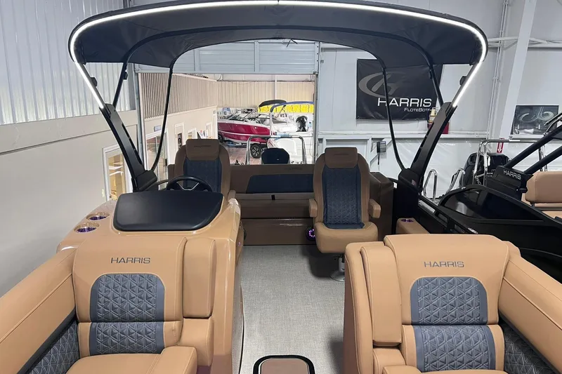 Slide: The Image of 2025 Harris Solstice 230 pontoon boat interior with luxurious seating and modern design. - 3