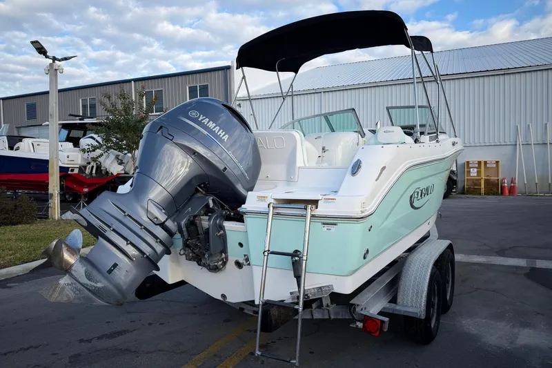 Slide: The Image of 2020 Robalo R207 Dual Console boat with Yamaha engine on trailer. - 4