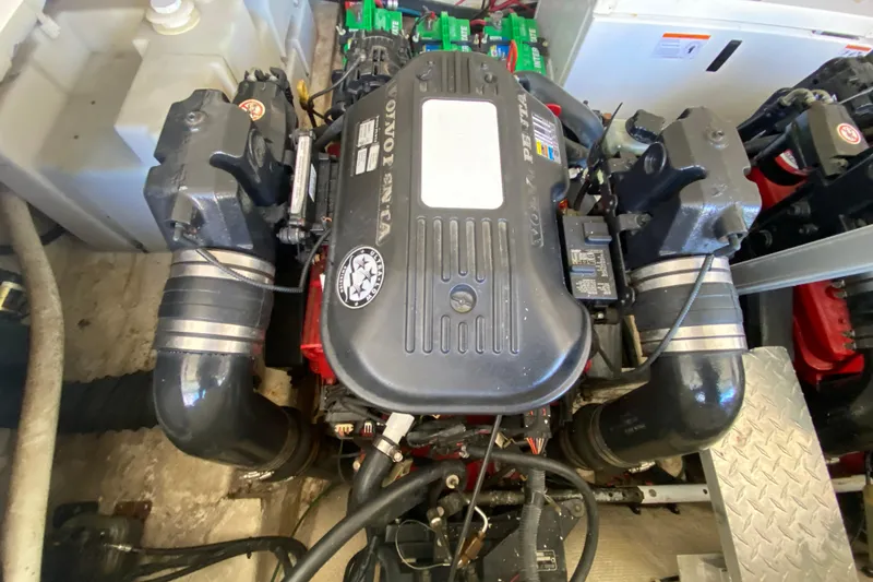 Slide: The Image of Engine compartment of a 2008 Regal 3360 Window Express boat, featuring a Volvo Penta engine. - 36