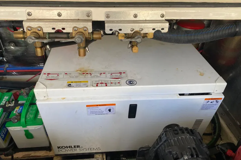 Slide: The Image of Engine room of 2008 Regal 3360 Window Express with Kohler power system. - 38