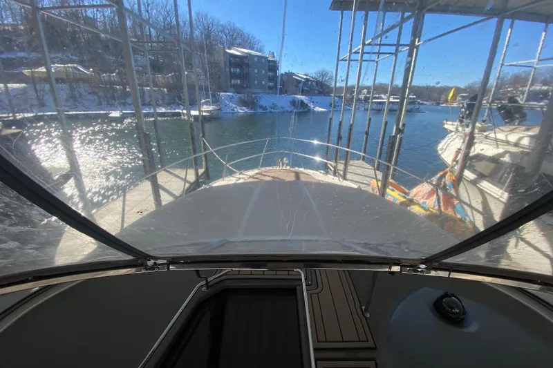 Slide: The Image of 2008 Regal 3360 Window Express yacht docked, view from cockpit, sunny winter day. - 41